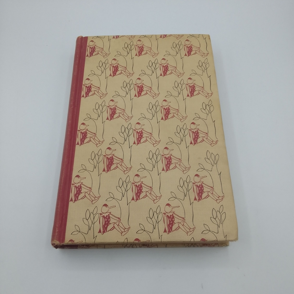 Vintage Beige and Red Hardcover Book Pinocchio